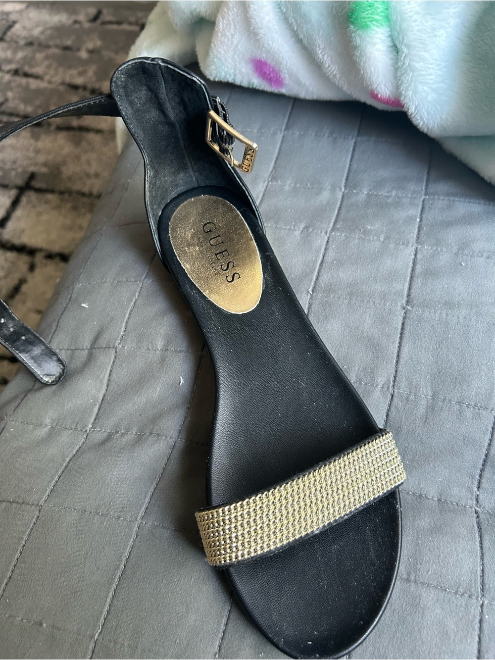 Guess Black Sandal with Gold Embellished Toe Band
